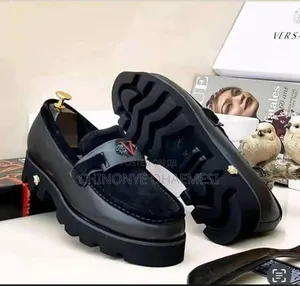 Versace Noir Titan Lug Loafers
