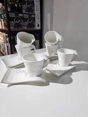 White Ceramic Wavy Tea Cup and Saucer Set (12 Pieces)