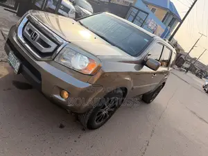 Honda Pilot EX-L 4dr SUV 4WD (3.5L 6cyl 5A) 2010 Gold