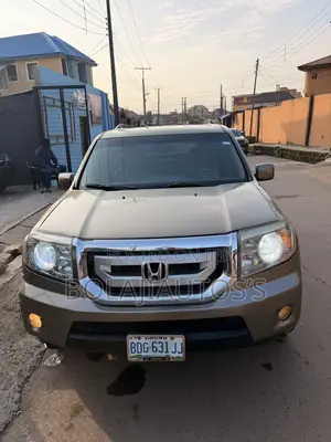 Honda Pilot EX-L 4dr SUV 4WD (3.5L 6cyl 5A) 2010 Gold