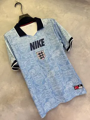England Energy 90s Inspired Polo Now Available in Store