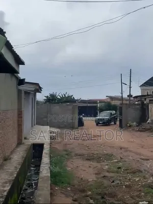 Half Plot in a Mini Estate at JokeAyo | Just a Building to Tarred Road