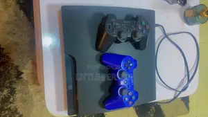 PS3 Slim With Two Pads
