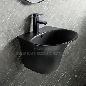 Matte Black Wall-Mounted Ceramic Basin With Faucet