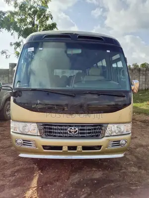 Toyota Coaster 2015 Gold