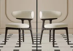 Modern Boucle Dining Chair – Curved Design, Dark Wood Frame