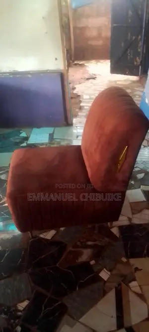 Brown Upholstered Single Seater Chair – Soft Fabric – Swivel Base