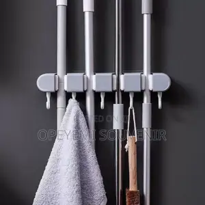Wall-Mounted Mop and Broom Holder