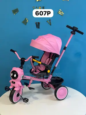 Pushing Tricycle Featuring a Distinct Astronaut-Shaped Design