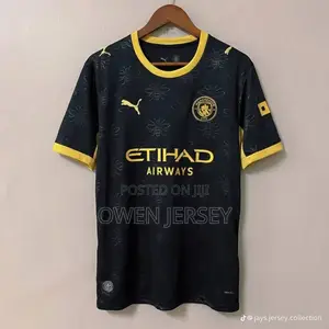 Manchester City Black Gold Football Jersey – Premium Away Style.