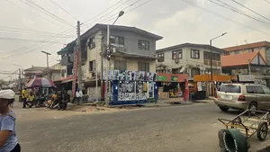 2 Plots of Land With Twin Duplex at Toyin Street Ikeja Lagos