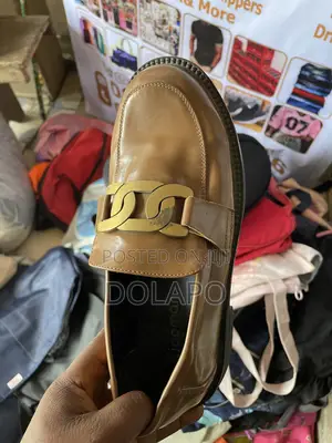 Newly Opened Adult Sack of Thrift Shoes