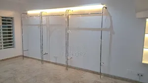 Black Wall Mounted Clothing Rack