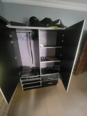 Two Door Wardrobe, With Two Drawers and Three Spaces for Shoes