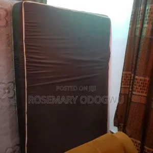 Clean and Neatly Used Dark Blue Foam Mattress
