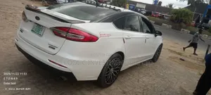 Ford Focus S 4dr Sedan (2.0L 4cyl 5M) 2014 White