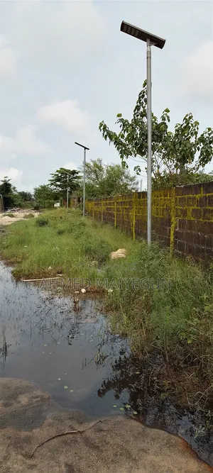 One Plot of Dry Land Fence Inside Gated Estate Title C of O