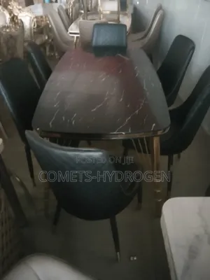 Imported 6-Seater Marble Dining Table Set With Quilted Leather Chairs
