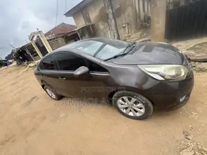 Kia Rio LX 4dr Sedan (1.6L 4cyl 6M) 2015 Brown