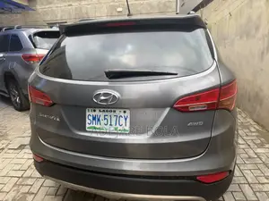 Hyundai Santa Fe Limited w/Saddle Interior 4dr SUV AWD (3.3L 6cyl 6A)