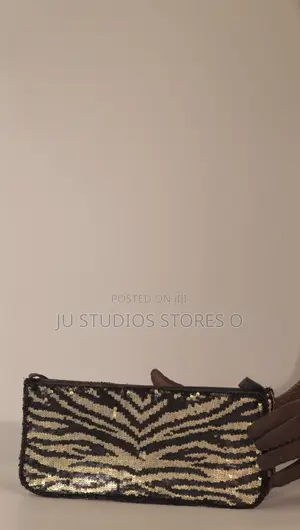 Accessorize Black and Gold Sequin Zebra Clutch