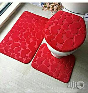 Bathroom Mat and Toilet