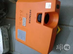 Orange Colour Hitachi Projector