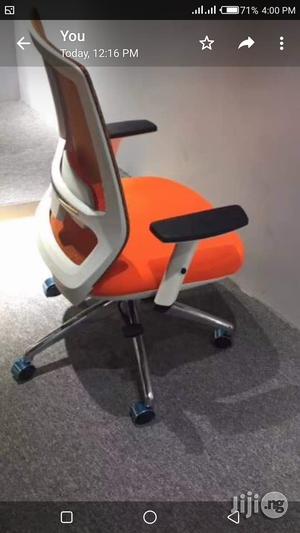 Orange Mesh Swivel Chair