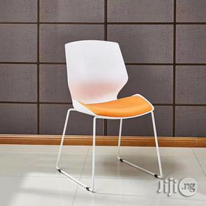 Plastic Stalking Chair With Foam Seat