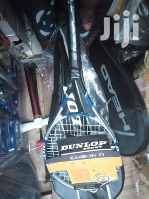Long Tennis Racket Head and Dunlop