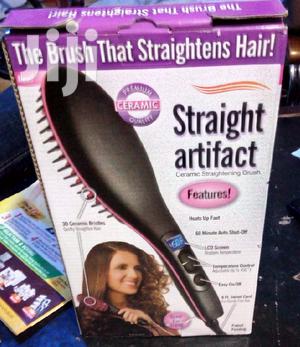 Electric Brush Straightens Hair
