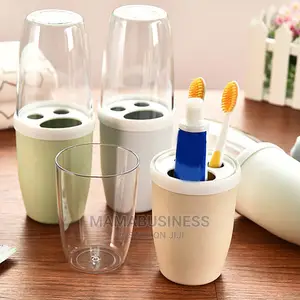 Toothpaste and Toothbrush Holder With Transparent Lid