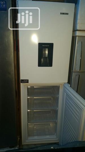 Samsung Fridge and Freezer With Water Dispenser.