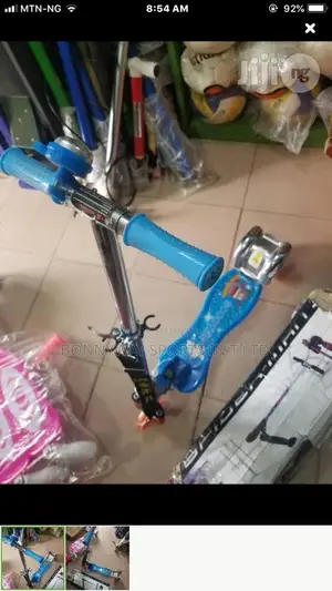 Children Riding Scooter
