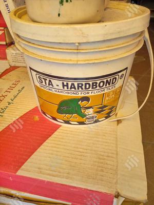 Rubber Tiles and Wall Paper Gum