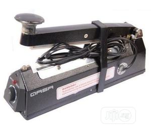 QASA Sealing Machine