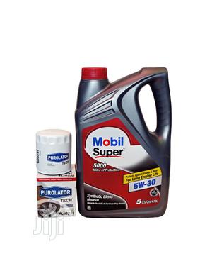 MOBIL Super SAE 5w30 Synthetic Blend Motor Oil.