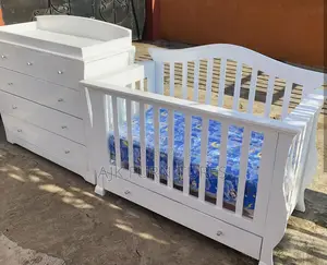 Exquisite Baby Crib and a Dresser
