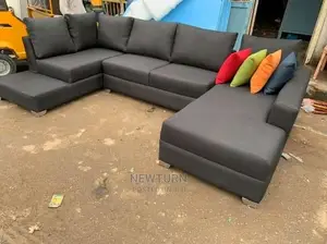 Quality L Shaped Sofa Set With Throw Pillows.