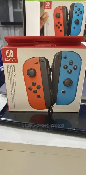 Nintendo Joy-Con Controllers (Neon Red/Blue)