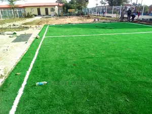 Natural Fake Grass Installation For School Tennis Court