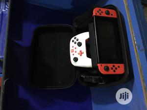 Nintendo Switch New + 12 Latest Games + Extra Pad