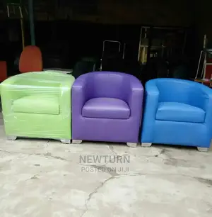 Mini Leather Bucket Chairs.