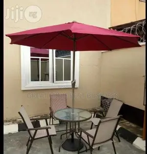 Umbrella, Table and Chairs