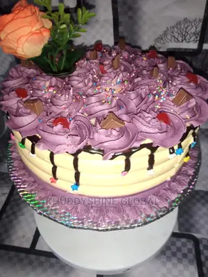 Buttercream and Purple Birthday Cake