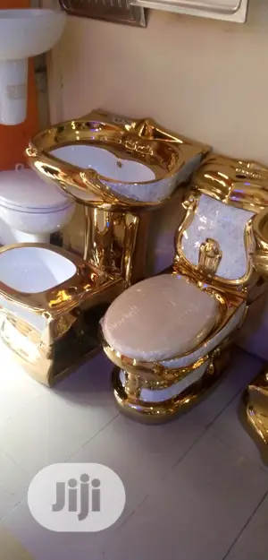 Executive Gold Water Closets.