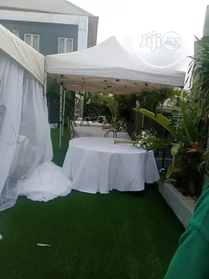 EZ UP 10ft by 10ft Tent Banquet Tables Chairs