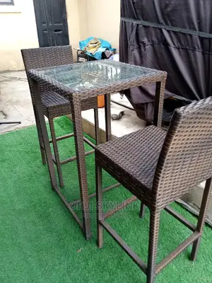 Two Set Of Rattans Chairs And Table