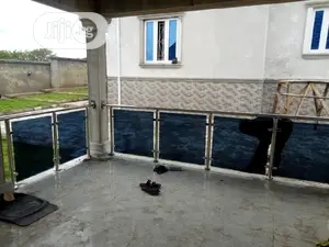 Stainless Railings Designed With Glass