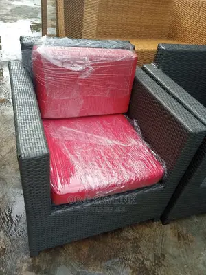 A Single Set of Rattan Indoors and Outdoorscushions Chairs